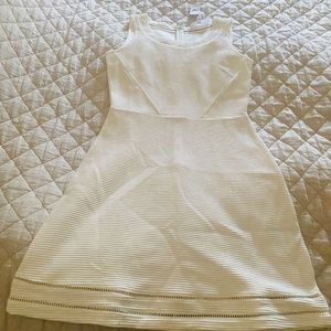 A new Brooks Brothers creamy white dress, size 4. Lovely!